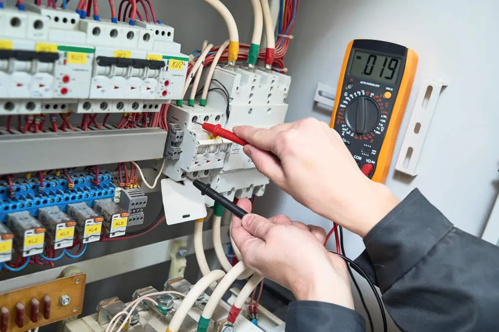 Electrician installing whole-home surge protection device in a Sacramento home